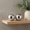 Set of Two Silver Buffed Aluminum Decorative Orb Tabletop Sculpture